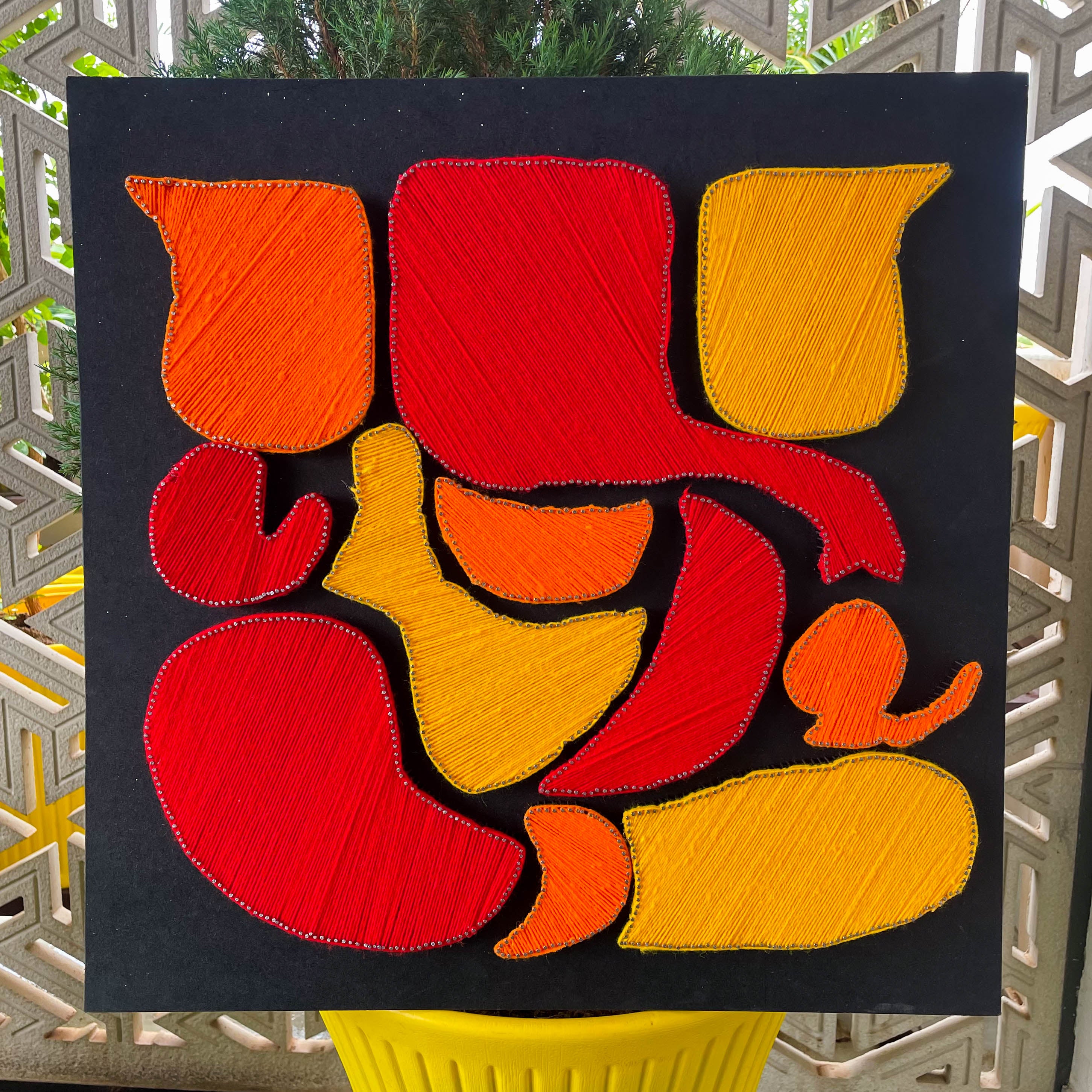 Divine Weavings: Ganesh Ji String Art Creation